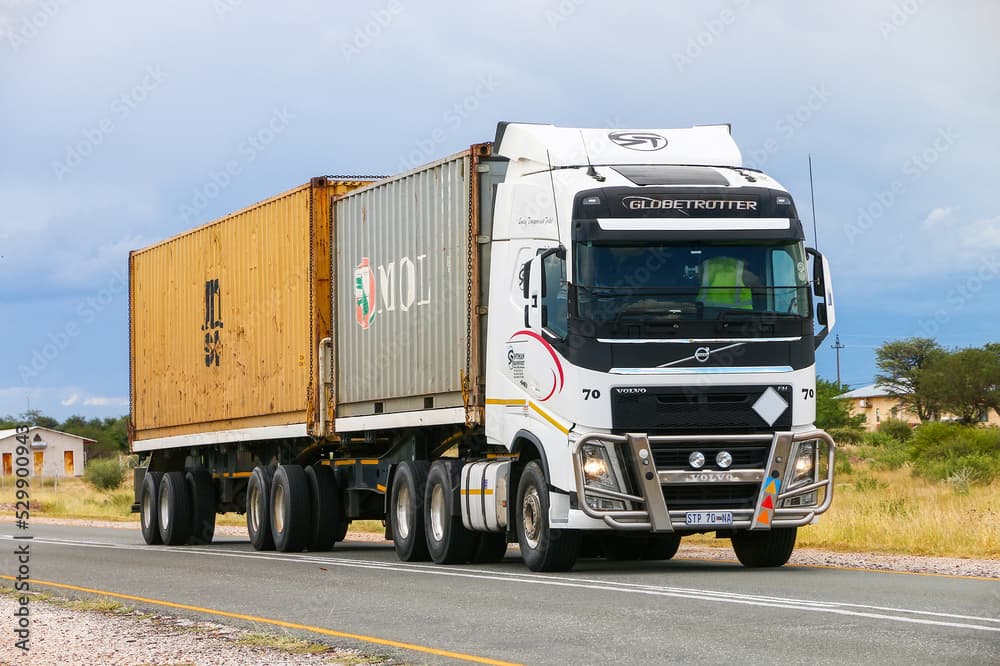 Truck on a highway in a mountainous region